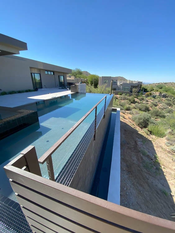 The Architecture of the Infinity Edge: A Guide to Negative Edge Pools in Scottsdale, luxury pool design article by Sun America Pools & Spas in Phoenix, AZ